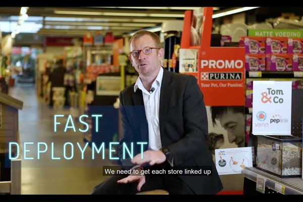 A still from a video featuring François van Bree, the IT infrastructure manager at Tom&Co, sitting in the middle of a store